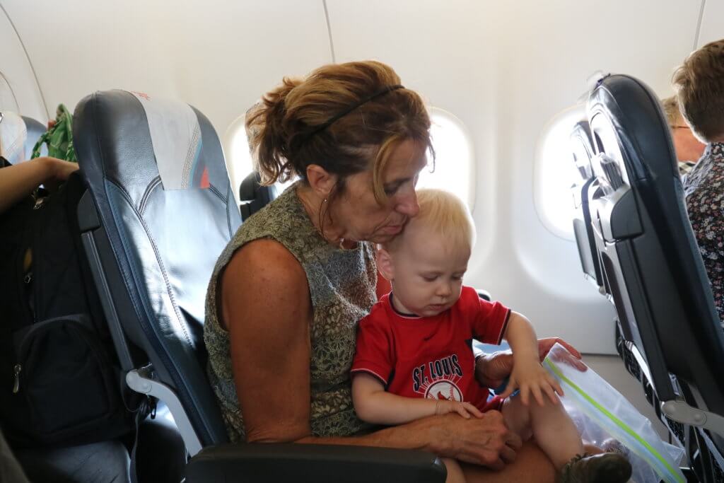 Mom and Benjamin on a plane